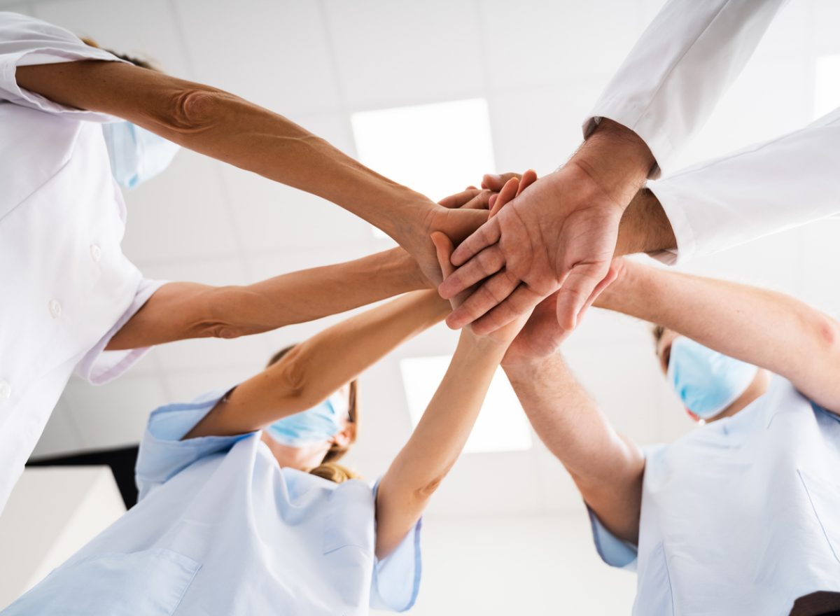 Nurse And Doctor Team Meeting Collaboration. Healthcare Medical Teamwork